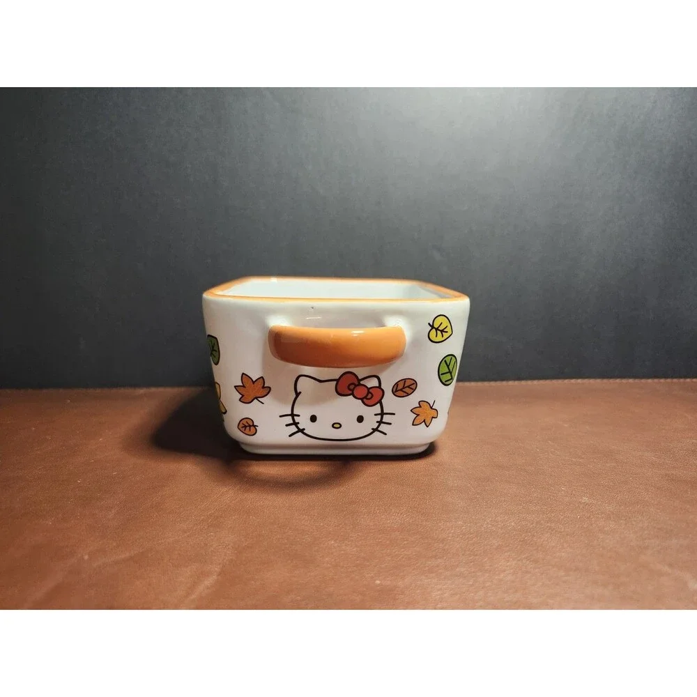 Hello Kitty fall-themed mini loaf pan featuring autumn leaves and vibrant orange